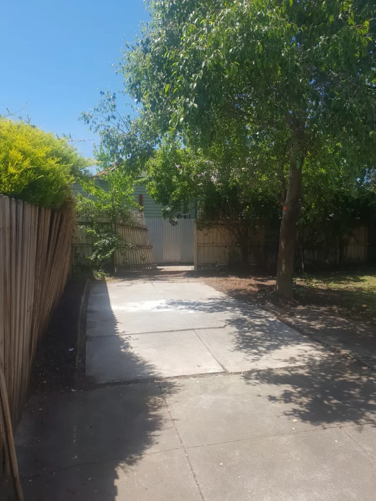 Driveway and cleared concrete slab in Preston after the shed was removed